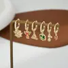 Moda estilo coreano nuevo un tarjetero tres pares pendientes de diseño personalizado conjunto regalo para amigas pendientes de botón de oreja de moda