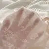 Braguitas de encaje floral semitransparentes de alta gama estilo francés con un tacto suave, inteligentemente diseñadas con una cinturilla trasera de lazo cruzado, bragas de triángulo transpirables y amigables con la piel
