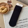Nuevos calcetines de otoño para mujer, calcetines retro japoneses de punto calado a media pantorrilla, calcetines largos versátiles de color liso, calcetines apilables sin costuras