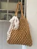 Bolso Tejido de Nicho Nuevo de Verano 2026 Transfronterizo para Mujer, Bolso Tote Calado, Bolso de Hombro Único para Vacaciones y Playa