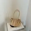 Bolso de gamuza para mujer 2026 nuevo otoño vintage Maillard bolso de hombro para el día a día con un toque de alta gama bolso cubo para el día a día