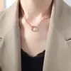 Estilo francês novo simples personalizado titânio aço redondo pingente assimétrico clavícula corrente versátil alto senso nicho joias para mulheres