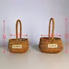 Cesta de flores portátil trançada em rattan de imitação de fábrica cesta de flores florais cesta de presente de feriado cesta de ovos cesta de frutas atacado