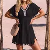 Vestido de ganchillo hecho a mano con diseño calado estilo europeo y americano transfronterizo, con bajo de flecos, entallado en la cintura, cómodo, protector solar, vestido para cubrirse en vacaciones de playa
