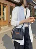 Bolso bandolera de mezclilla vintage casual comercio exterior transfronterizo 2026 nueva moda moderno versátil simple con cordón