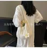 Bolso de mujer de gran capacidad 2026 nuevo bolso de hombro versátil para vacaciones en la playa, bolso de playa, bolso tote tejido de paja para el trabajo