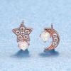 Pendientes de platino con forma de estrella y luna de ópalo, de dibujos animados japoneses, suaves, cortos y asimétricos.