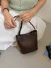 Bolsa de balde trançada vintage da moda para comércio exterior, bolsa de ombro de nicho de moda transfronteiriça, bolsa transversal versátil casual para o dia a dia