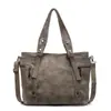 Bolsa Tote Grande Capacidade Estilo Retro Europeu e Americano Solo Sujo Feminina 2025 Nova Coleção Primavera Bolsa de Ombro Transversal Simples Casual Tendência