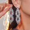 Europa y Estados Unidos transfronterizo nuevo sentido alto aretes largos de diamantes completos en forma de 8 temperamento de moda personalidad aretes de aretes famosos de Internet