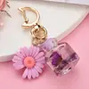 Chaveiro de fivela de lua personalizado com crisântemo pequeno Acessórios de joia DIY garrafa de perfume de simulação divertida garrafa de desejo atacado