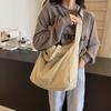 Bolsa Tote de Gran Capacidad para el Trayecto Diario Nuevo Estilo Primavera-Verano 2026 Bolso de Lona Simple y Versátil Bolsa para Estudiante Universitaria