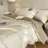 Juego de ropa de cama de lujo de cuatro piezas de algodón de fibra larga de 80 hilos, sábana bajera 100% algodón, funda de edredón bordada, juego de tres piezas de alta gama