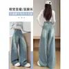 Jeans feminino de comprimento estendido com perna curva, estilo único da primavera de 2026, deslumbrante e versátil, com lantejoulas e strass, calça jeans ampla e solta
