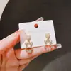 Aguja de Plata 925 Suministro de Puesto de Mercado Nocturno Pendientes Moda Femenina Asimétricos Populares Explosiones Japonesas y Coreanas Pendientes A