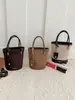 Bolsa transversal de moda coreana muito estilosa, nova bolsa de mão para o início do outono de 2026, bolsa tipo balde da moda, bolsa de ombro única e moderna