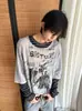 Exclusivo para ventas transfronterizas: Camiseta estampada a rayas patchwork de diseño estilo americano, dos piezas falsas, top casual versátil holgado para hombre