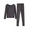 Conjunto de ropa interior térmica de doble protección contra el frío, de hilo ultra fino para mujer, nuevo otoño/invierno, color liso, versátil, amigable con la piel, sin costuras, top y pantalón de otoño para mujer