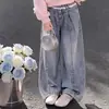 2026 Niñas 2026 Colección Nueva Primavera y Otoño: Elegante Conjunto de Dos Piezas con Top de Solapa con Lazo y Pantalones de Mezclilla Chic