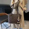 Bolsos tote de alta calidad al por mayor para mujer, nueva colección otoño 2026, bolsos de hombro de color liso con estampado de diamantes, adecuados para el trabajo y el uso diario