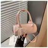 Bolsa cilíndrica de mão coreana de nicho para mulheres, nova bolsa estilo bowling da moda para o verão de 2026, bolsa de ombro e transversal com textura de alta qualidade