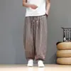 Calças amplas e fluidas em um novo estilo chinês, calças harém finas de seda gelada casuais relaxadas de verão masculinas com estampas de padrões tradicionais chineses