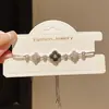 Pulsera de Trébol Flor de Madreperla con Circonita Estilo Lujo Ligero, Pulsera Dulce Exquisita y de Moda, Joyería de Gama Alta de Nicho para Mujeres