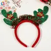 Faixa de Cabeça de Natal Transfronteiriça Qiyue Faixa de Cabeça com Galhos de Rena Decorações de Natal Fivela Plástica para Cabeça de Crianças Decoração de Festa