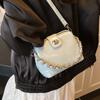Bolso de concha de mano de alta gama para mujer, Nuevo bolso de hombro de moda retro y moderno de la primavera de 2026, Bolso casual de nicho para mujer