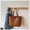 2026 Nueva Bolsa de Gran Capacidad para Mujer Otoño e Invierno Casual Simple Bolso de Hombro Textura Clase Bolso Tote para Viaje