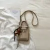 Shuai Mijia 2026 Verano Nuevo Remache Bolsa para Teléfono de Motocicleta Bolso Cruzado Pequeño Dulce Fresco de Moda Bolso de Mano para Mujer