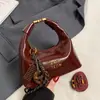 Bolso de hombro sencillo de moda para mujer, otoño e invierno 2025, nuevo estilo coreano, bolso cruzado informal de alta gama a la moda con múltiples combinaciones.