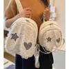 Linda mochila para mujer 2026 nuevo modelo, mochila pequeña de diseño único, bolsa escolar para estudiante, versátil con colgante de muñeca, estilo nicho