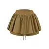 Falda corta sexy estilo americano con cordón, cintura elástica, línea A, anti-exposición, para mujer, verano, adelgazante, plisada abullonada