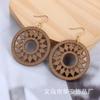 Aretes de madera más vendidos de comercio electrónico transfronterizo, moda europea y americana, aretes de madera geométricos huecos exagerados hechos a mano