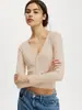 Camiseta de manga larga ajustada de color liso con cuello en V, jersey para mujer, de otoño, nueva, transfronteriza de Amazon Europa y América, con botones en la espalda, para mostrar el ombligo