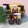Frasco marrom de 50ml com bomba de clipe, frasco de ombro inclinado, frasco de bomba de loção de 50ml, frasco de refil para gel de banho, frasco de limpador facial