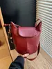 Moda Transfronteriza 2026 Nuevo Bolso Cubo de Nicho Retro Simple de Gama Alta Versátil para Mujer Bolso de Hombro Bolso Cruzado