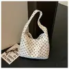 Bolso de hombro versátil de estilo coreano de nicho transfronterizo para otoño 2026, nuevo para mujer, con textura de lunares, simple