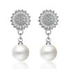 Temperamento dulce versión coreana de aretes de copo de nieve aretes de perla de circonita fabricantes de joyería de moda venta al por mayor