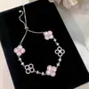 Pulsera de trébol de cuatro hojas de nácar natural con cordón, una pulsera floral lujosa y elegante para mujer