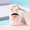 Llavero colgante de conejo de dibujos animados con textura aterciopelada, lindo colgante de peluche para mochila escolar, regalo para estudiantes, mejores amigos y parejas.
