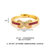 Anillo ajustable estilo vintage de lujo ligero de mediados de siglo con diamantes rojos entrelazados, anillo para mujer chapado en oro vietnamita al por mayor