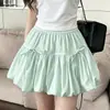 Falda Floral de Niña Verano 2026 Estilo Nuevo para Niñas Mayores, Elegante Media Falda Blanca, Falda Corta de Alta Gama para Niños