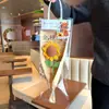 Arreglos de Flores Artificiales de Girasol para la Temporada de Graduación Ganaron el Primer Lugar en la Competencia, y se Usan como Bendiciones y Regalos para Compañeros de Clase durante los Exámenes de Ingreso a la Escuela Preparatoria y la Universidad