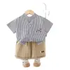 Traje de verano de manga corta para niños 2025 Nuevo Informal Coreano para Niños Atractivo Perro Vertical Dos Piezas Bebé Moderno
