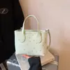 Bolsa Tote de Gran Capacidad Transfronteriza Estilo Nuevo Primavera 2026 Bolso de Hombro para Viajes al Trabajo Bolso de Mano de Moda Gama Alta