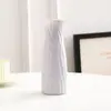 Jarrón de plástico creativo de estilo nórdico, redondo, moderno, sencillo, anticaída, de porcelana de imitación, para decoración del hogar.