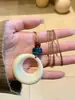 Nuevo Collar Colgante Anillo de Resina Estilo Chino Retro para Mujer Nicho Largo Cadena de Cuero de Alta Gama Accesorios para Suéter Clavícula