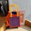 Novo design de nicho bonito dos desenhos animados Mini malha saco do telefone móvel All-match pequeno portátil Commuter Crossbody pequeno saco quadrado